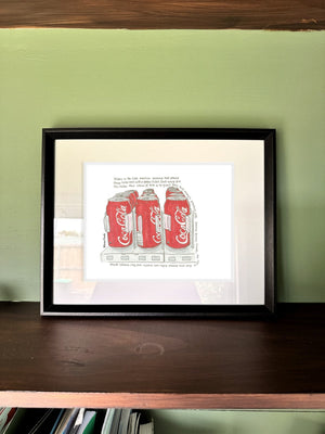 The Golden Ticket Cola in a real frame, on the wall