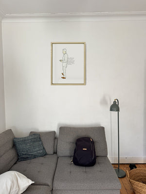 The Man with Luminous White Hair in a real frame, on the wall