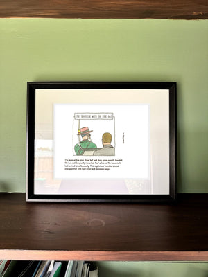 The Traveller with the Pink Hat in a real frame, on the wall