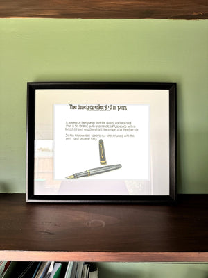 The Time Traveller & The Sailor Pen in a real frame, on the wall