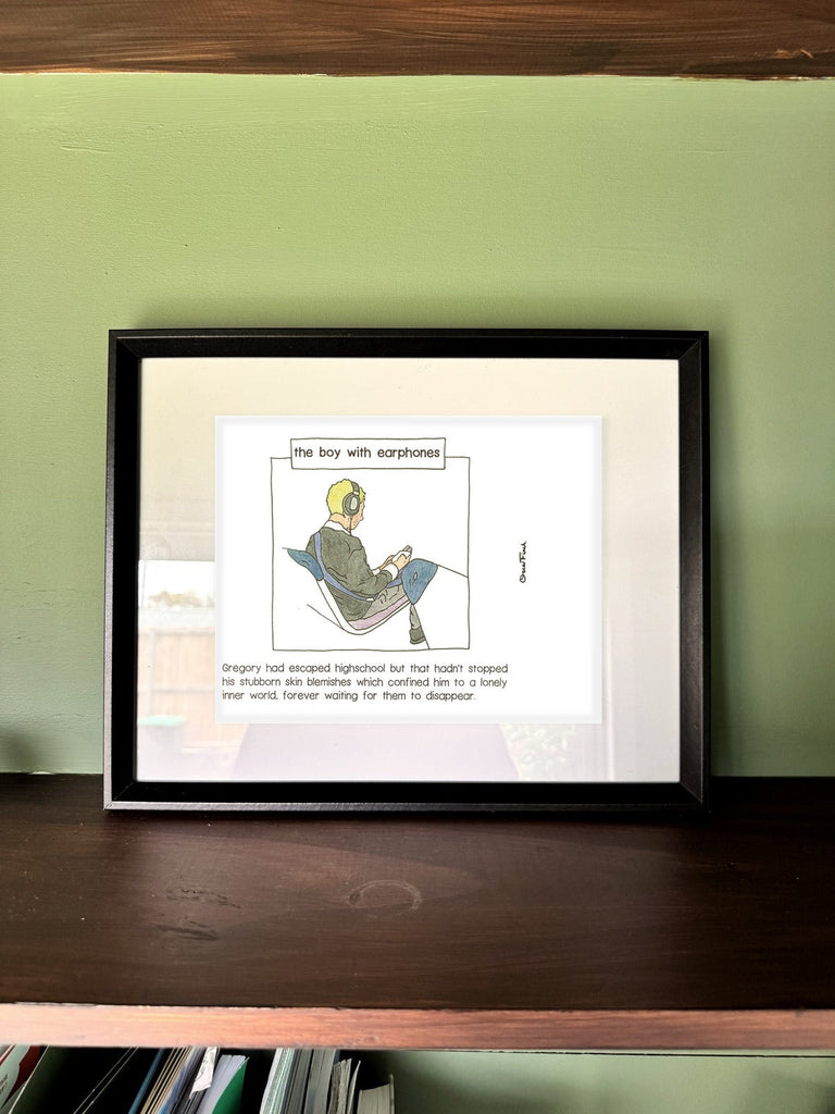 The Boy with Earphones in a real frame, on the wall