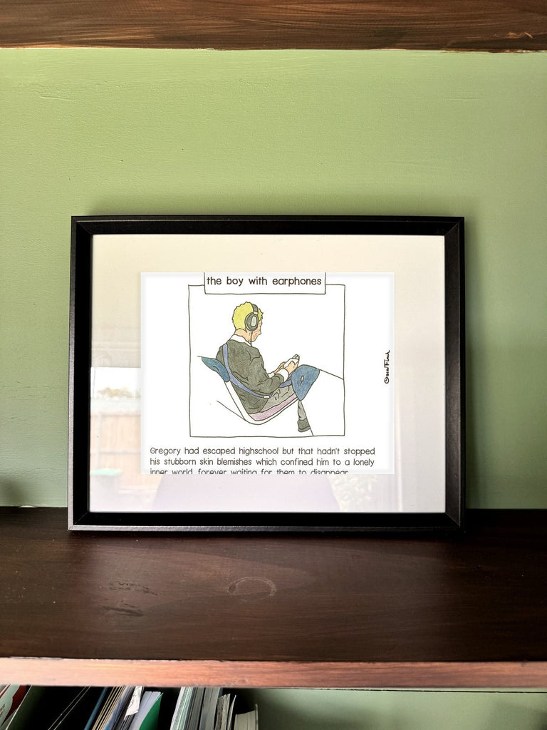 The Boy with Earphones in a real frame, on the wall