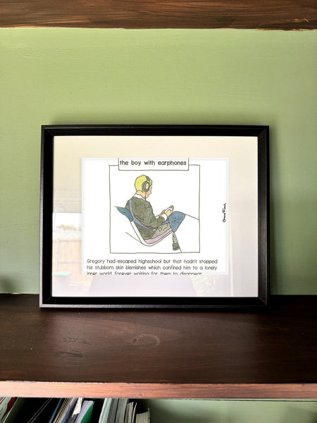 The Boy with Earphones in a real frame, on the wall