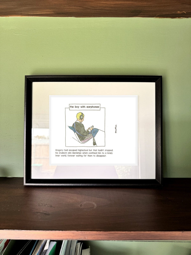 The Boy with Earphones in a real frame, on the wall