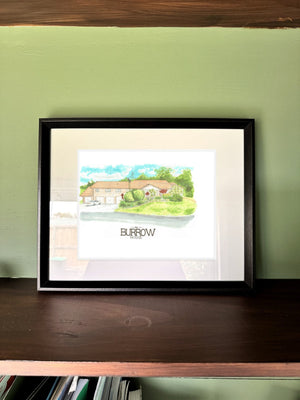 The Burrow House in a real frame, on the wall