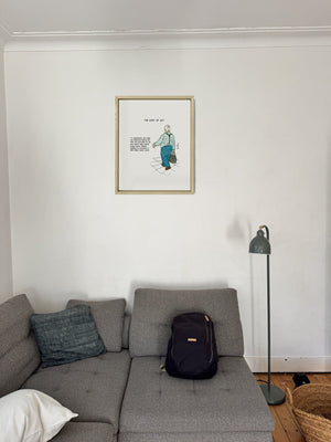 The Cost of Joy in a real frame, on the wall