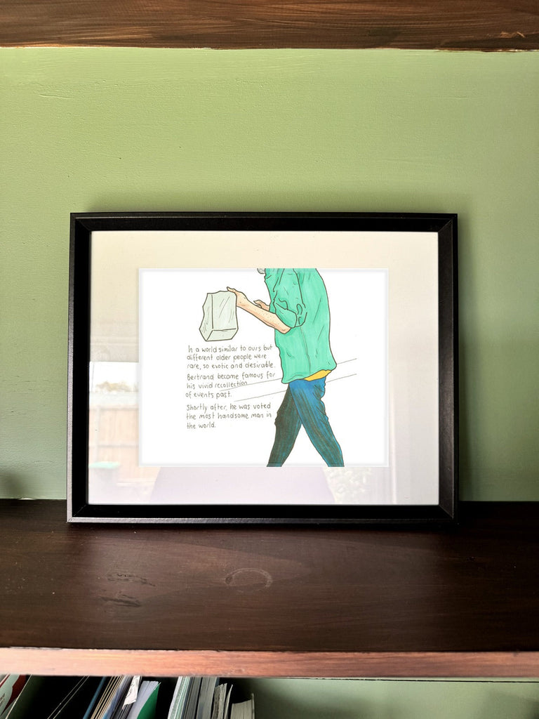 The Handsomest Man in a real frame, on the wall