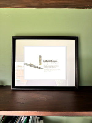 The Time Traveller & The Conklin Pen in a real frame, on the wall